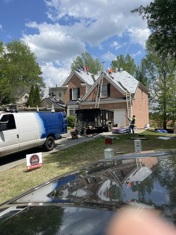 Slide of Hill Top Roofing