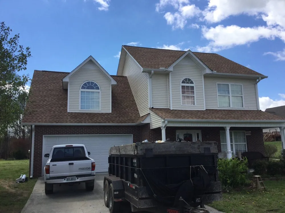 Slide of Hill Top Roofing