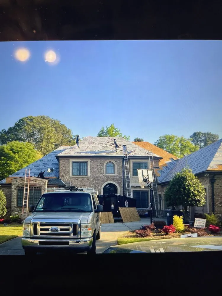 Slide of Hill Top Roofing