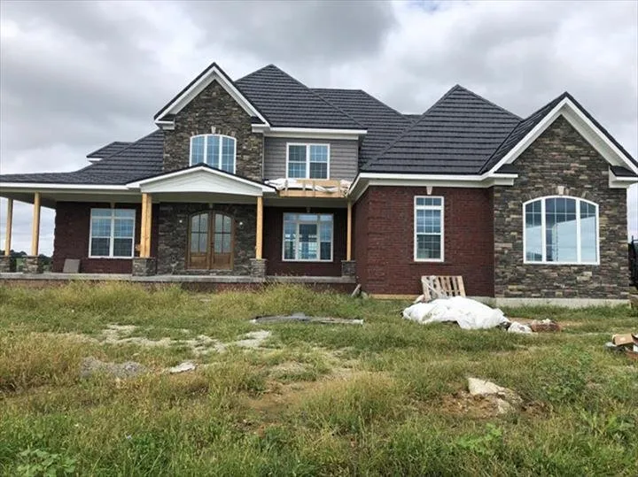 Slide of Hillside Fireplace & Stone