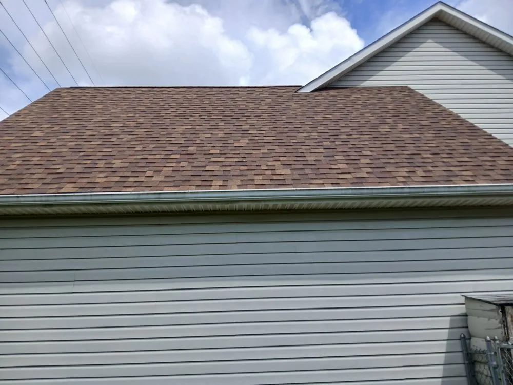 Local shingle roofing service for residential properties in Adamsville, OH by Hillside Roofing
