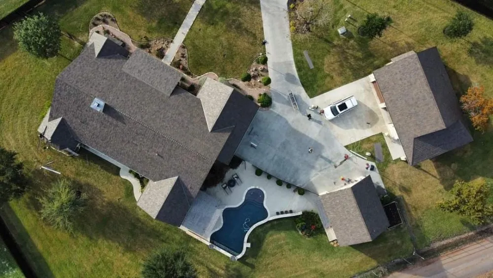 Slide of Hired Guns Roofing & Restoration