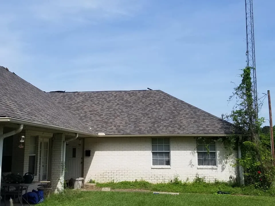 Slide of Hired Guns Roofing & Restoration