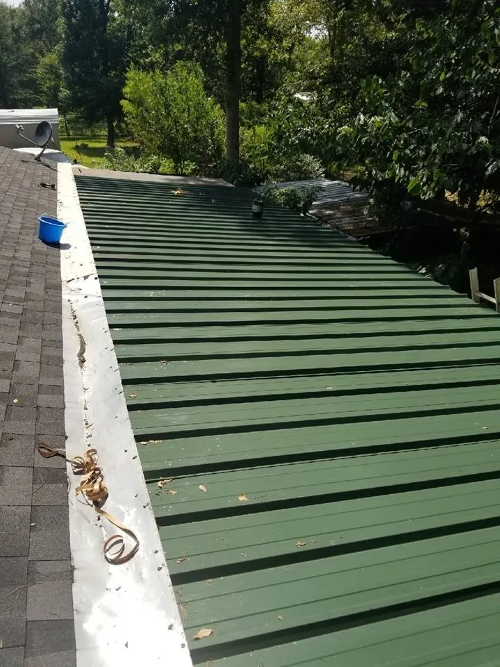 Slide of Hired Guns Roofing & Restoration