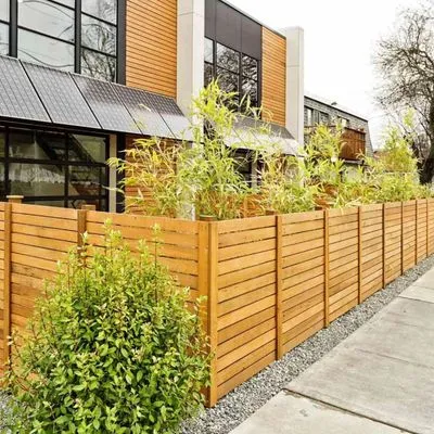 Hired Guns Roofing & Restoration Logo