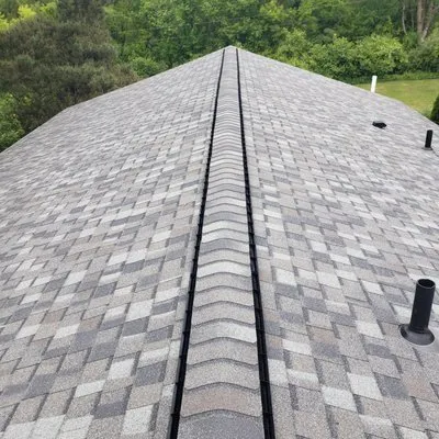 Hired Guns Roofing Logo