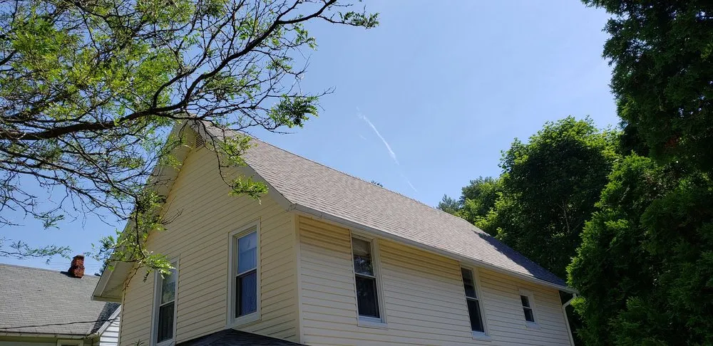 Slide of HIS Construction & Roofing