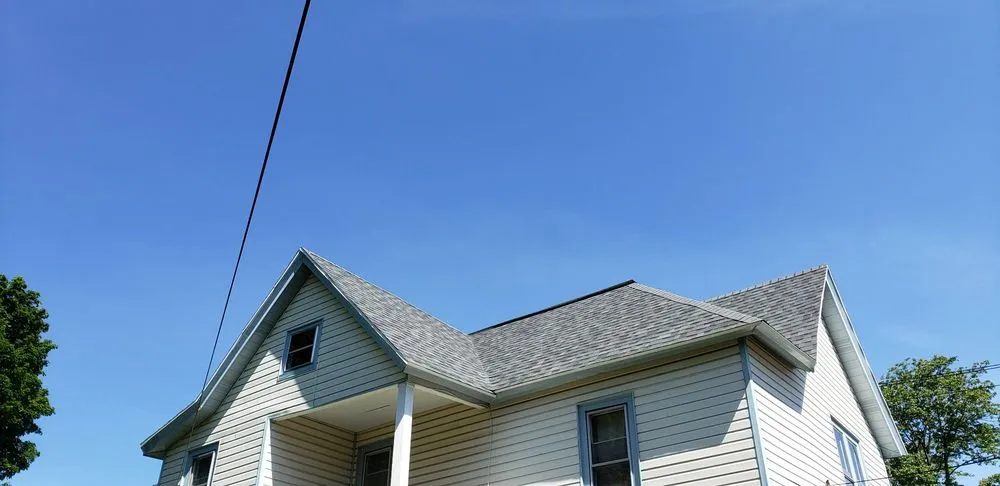 Slide of HIS Construction & Roofing
