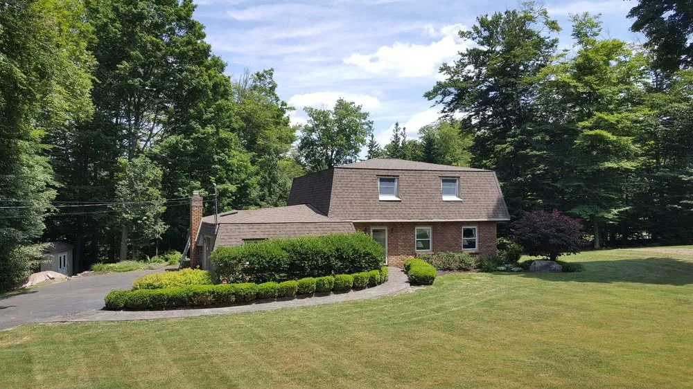 Slide of HIS Construction & Roofing