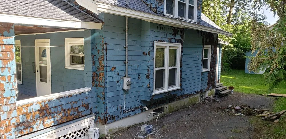 Slide of HIS Construction & Roofing