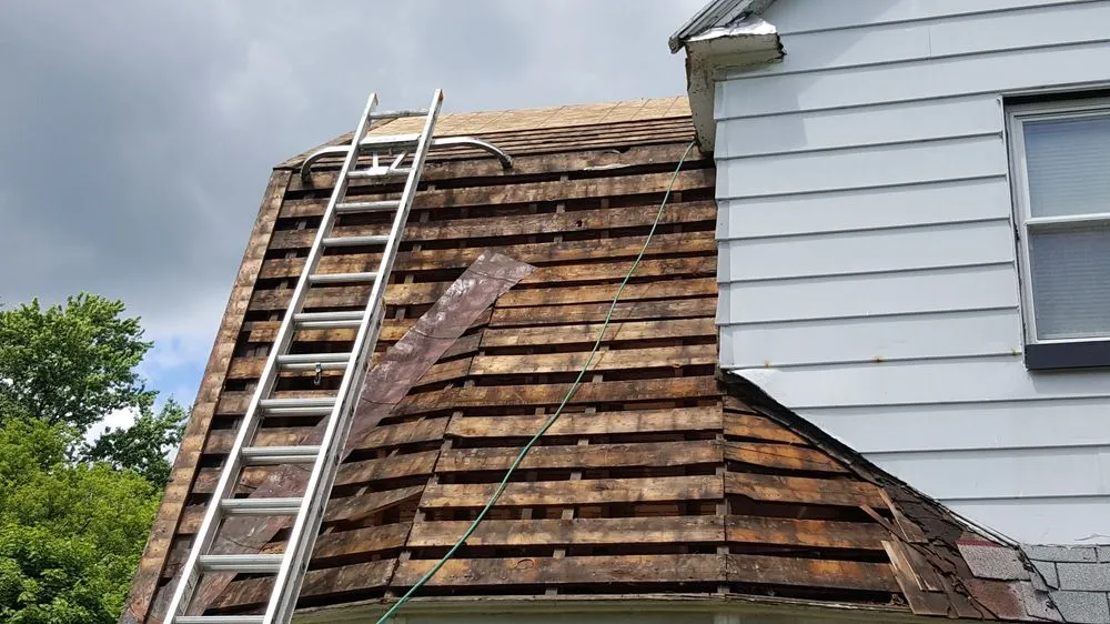 Slide of HIS Construction & Roofing