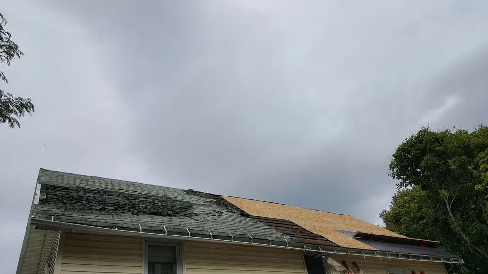 Slide of HIS Construction & Roofing