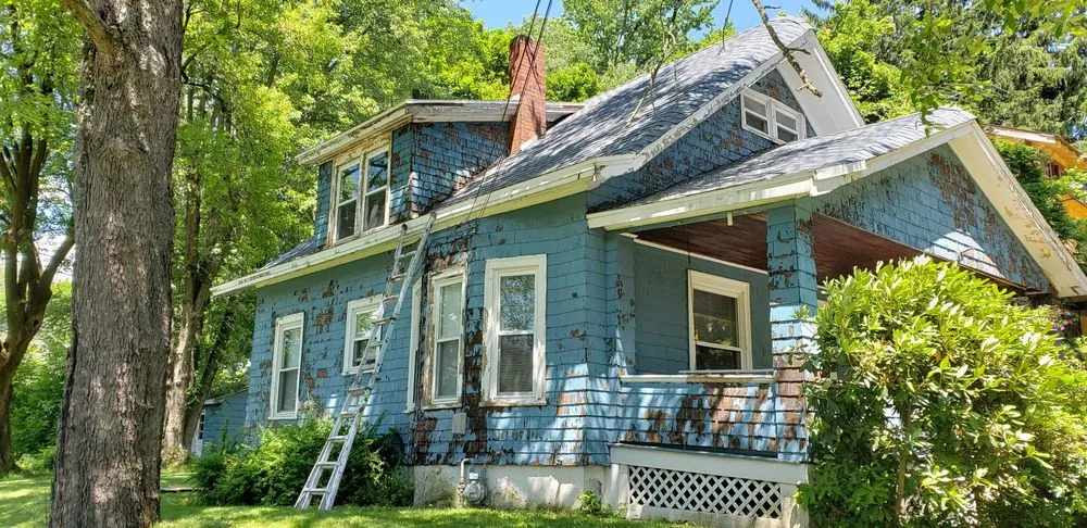 Slide of HIS Construction & Roofing