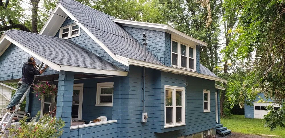 Slide of HIS Construction & Roofing