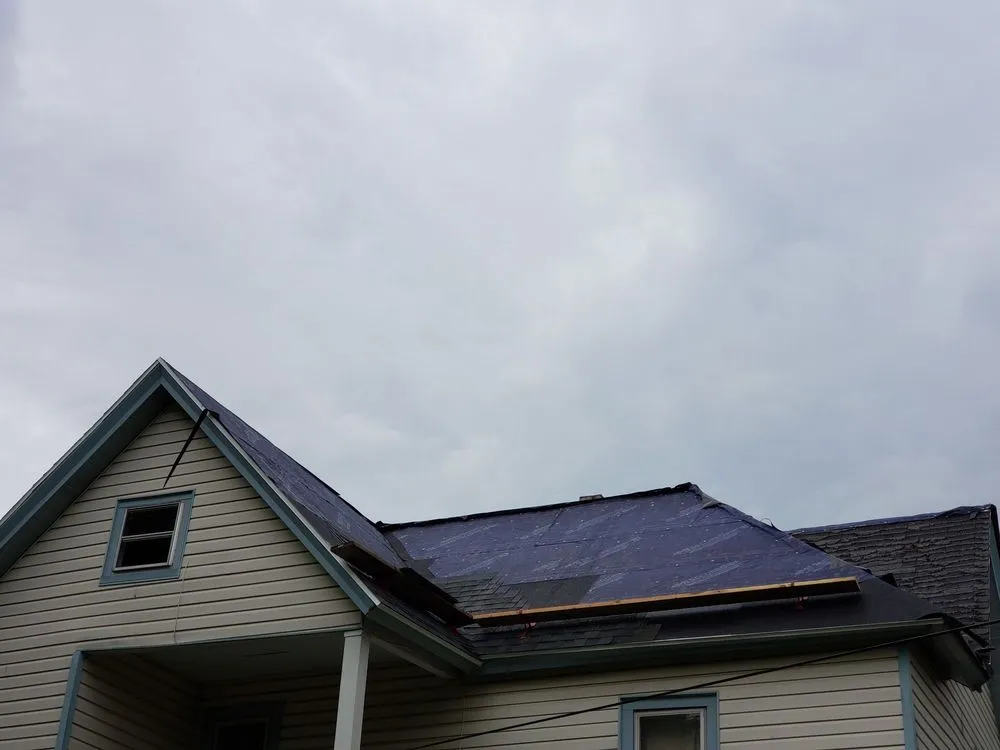 Slide of HIS Construction & Roofing