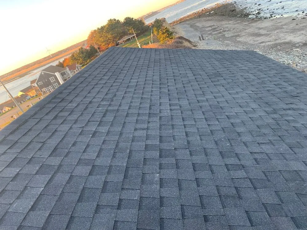 Slide of Hitchcock Roofing and Construction