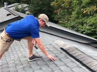 Slide of Hitchcock Roofing and Construction