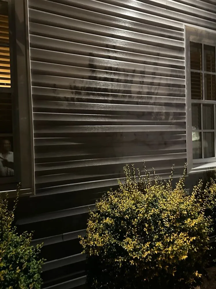 Slide of Hixon's Roofing