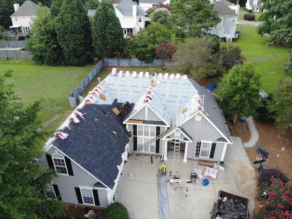 Slide of Hixon's Roofing