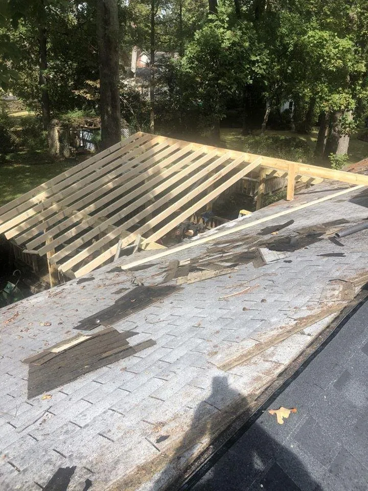 Slide of Hixon's Roofing