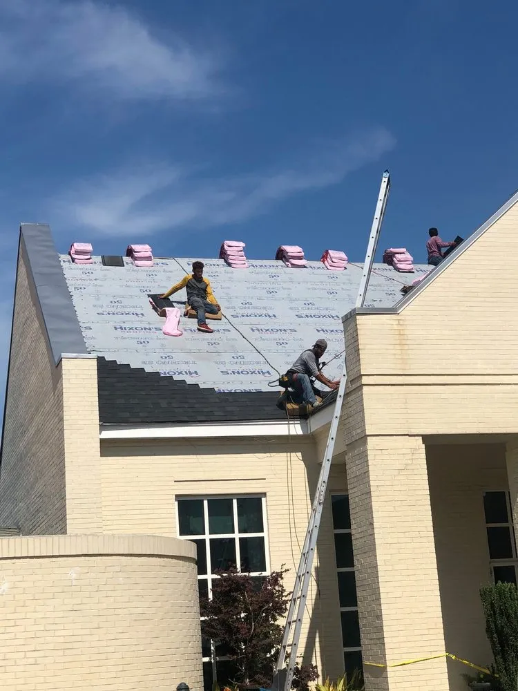 Slide of Hixon's Roofing