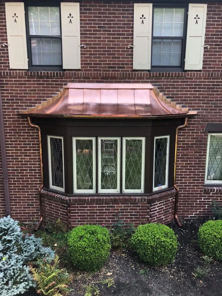 Slide of HKC Roofing & Sheet Metal