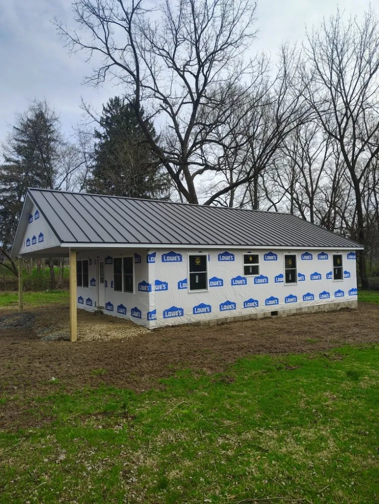 Local flat roof repair same-day service in Howard, OH by Hm Construction