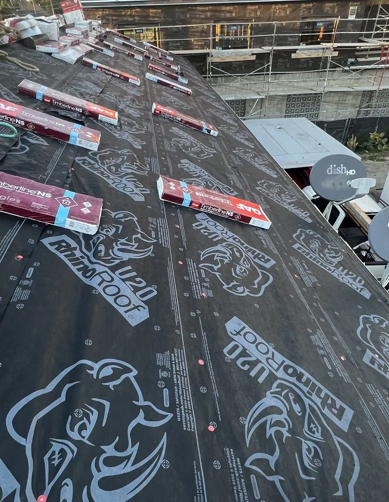 Slide of H&M Roofing