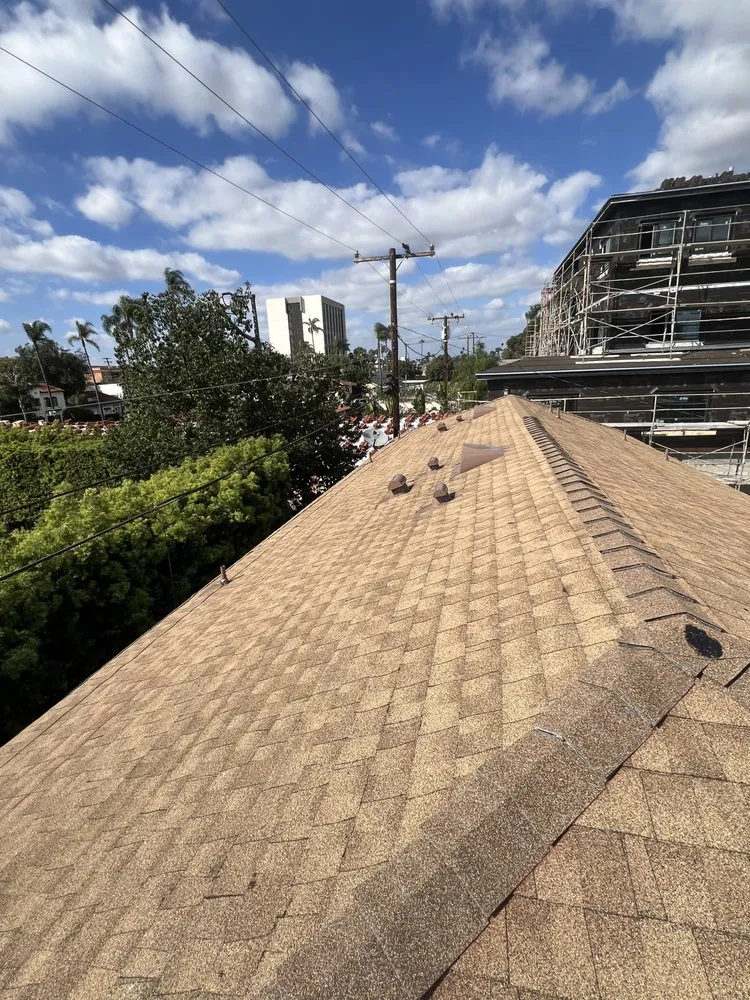 Slide of H&M Roofing