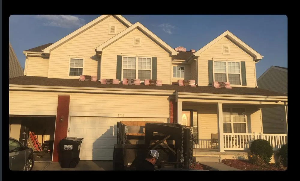 Slide of H&m Roofing