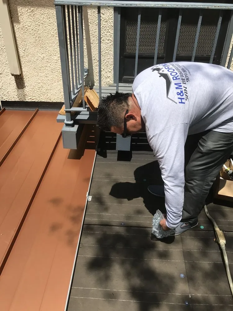 Slide of H&M ROOFING