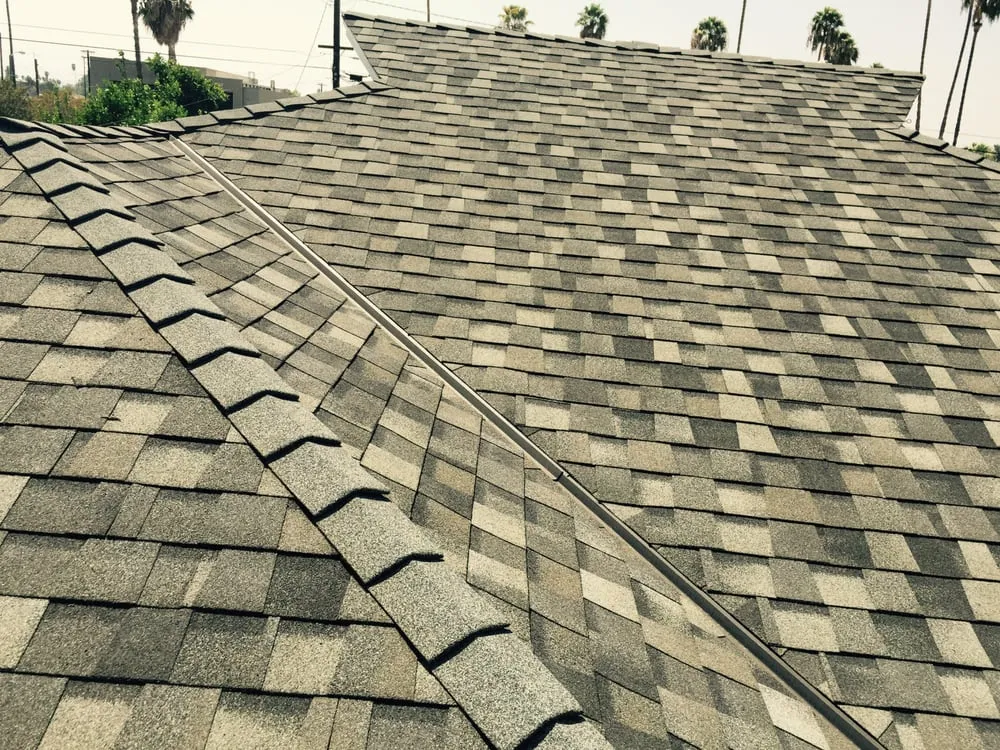 Slide of H&M ROOFING