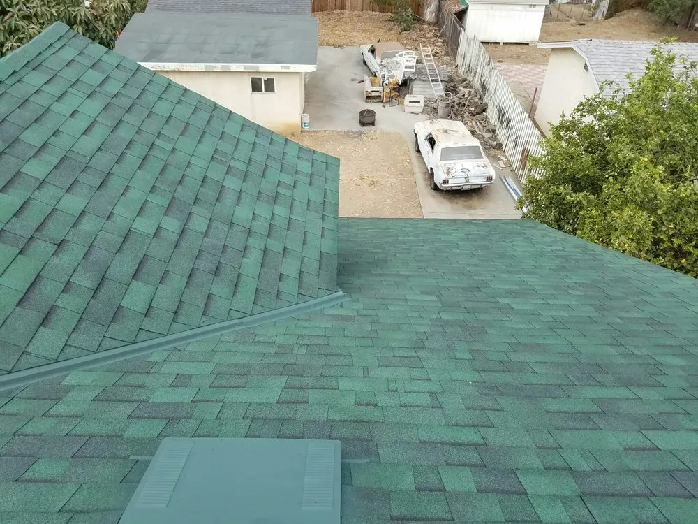 Slide of H&M ROOFING