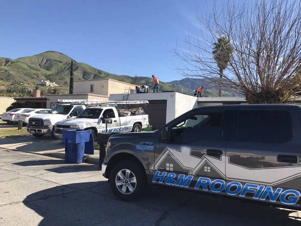 Slide of H&M ROOFING