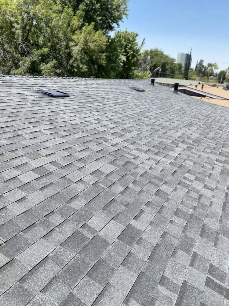 Slide of H&M ROOFING