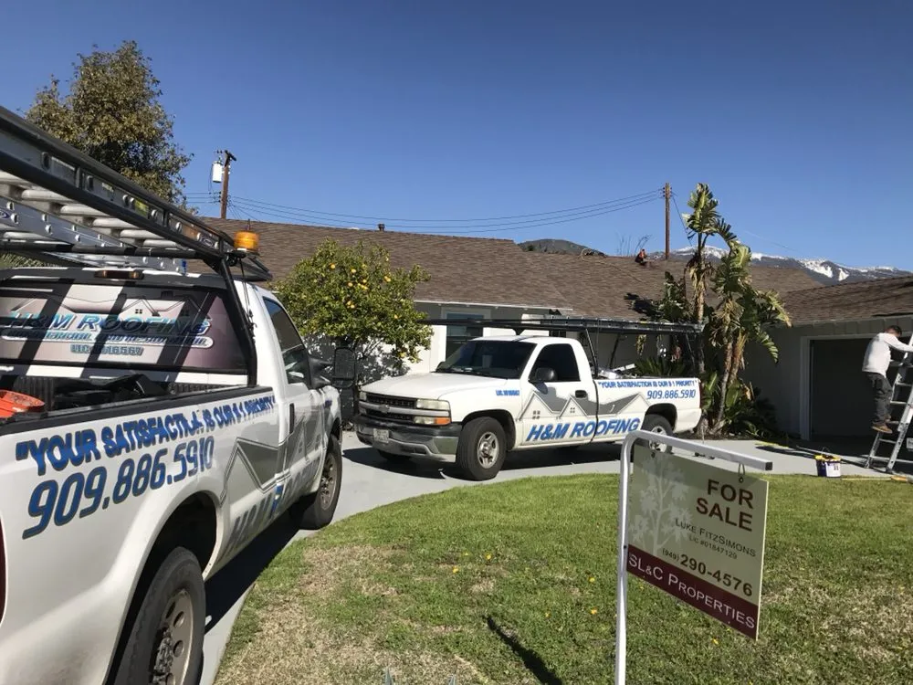 Slide of H&M ROOFING