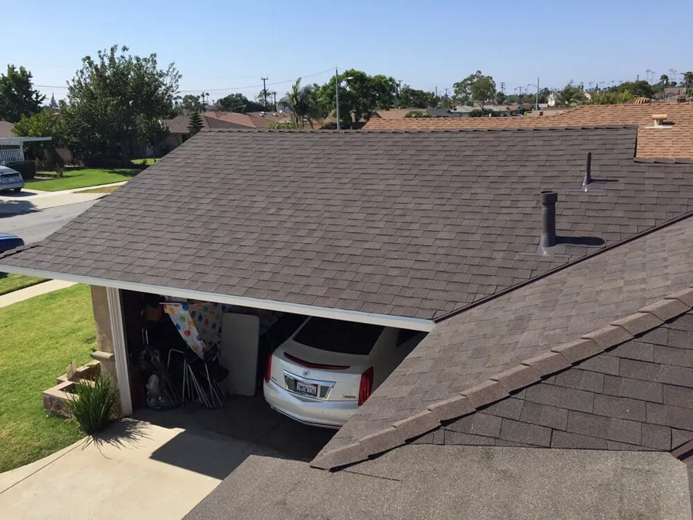 Slide of H&M ROOFING