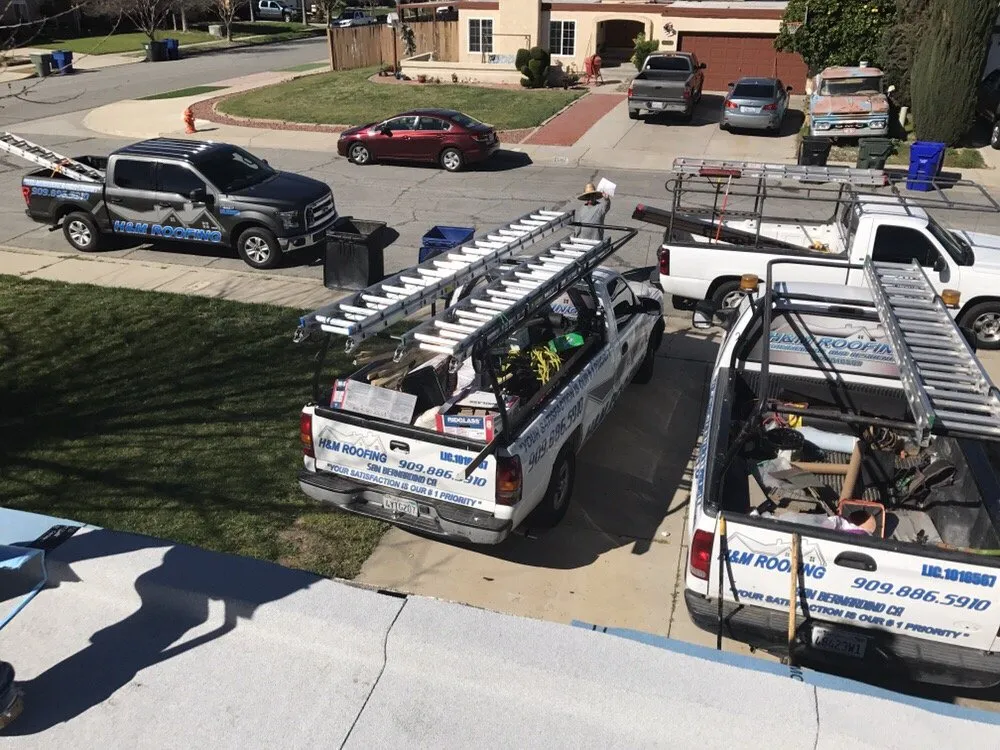 Slide of H&M ROOFING