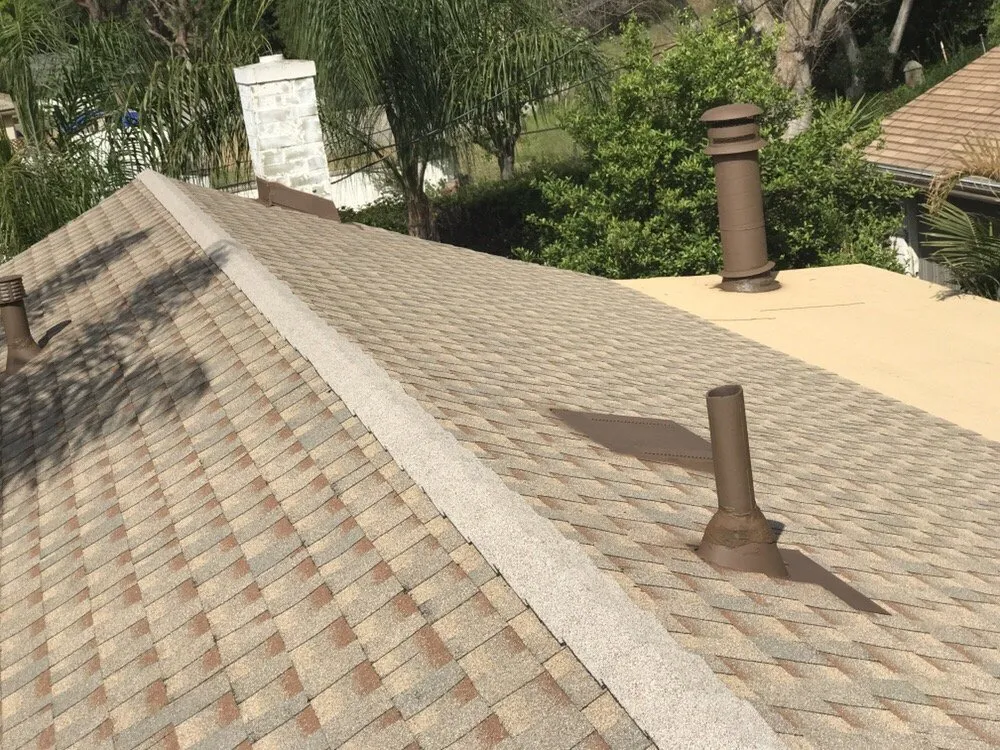 Slide of H&M ROOFING