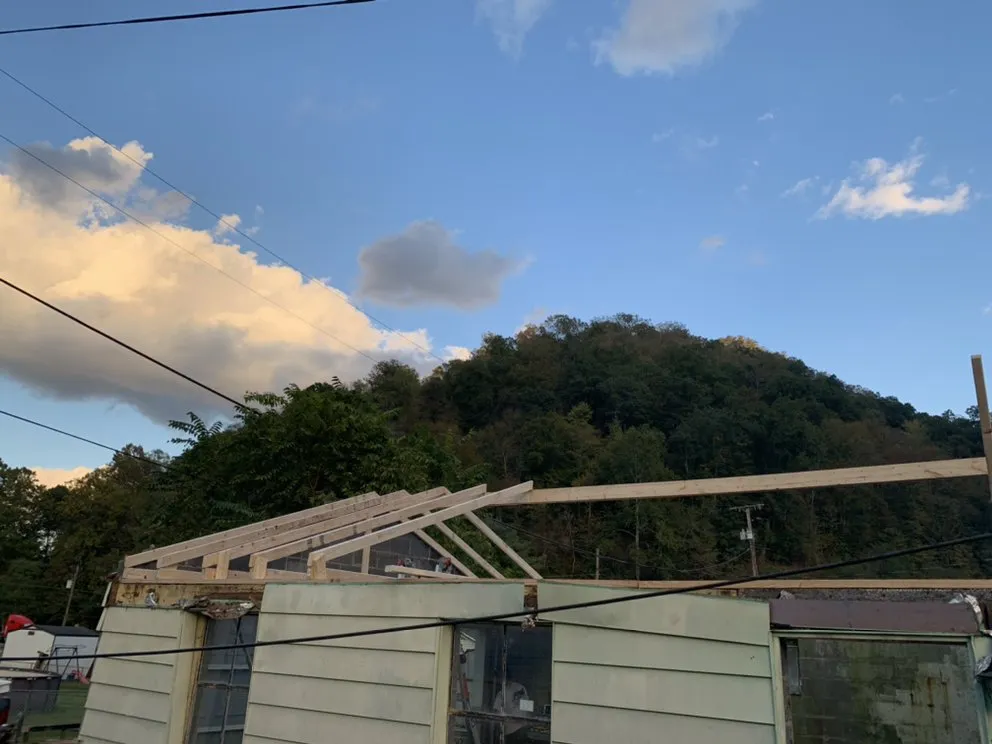 Slide of Hodge Roofing Services