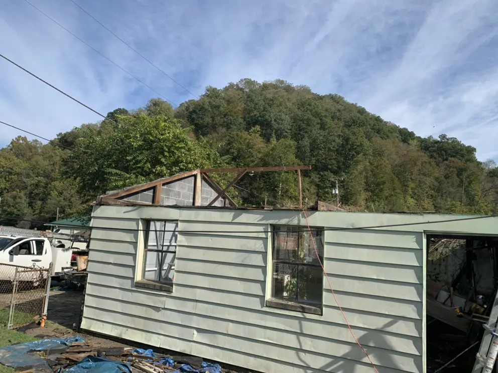 Slide of Hodge Roofing Services