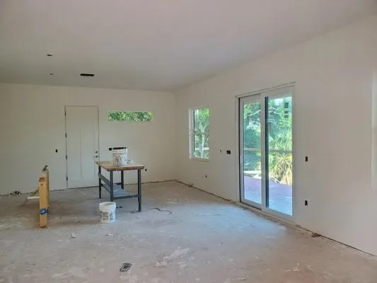 Hoffman Construction & Hammock Homes Logo