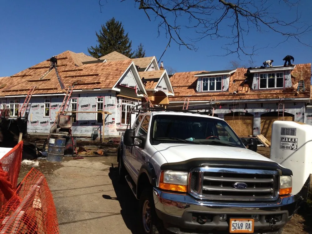 Slide of Hogan Roofing