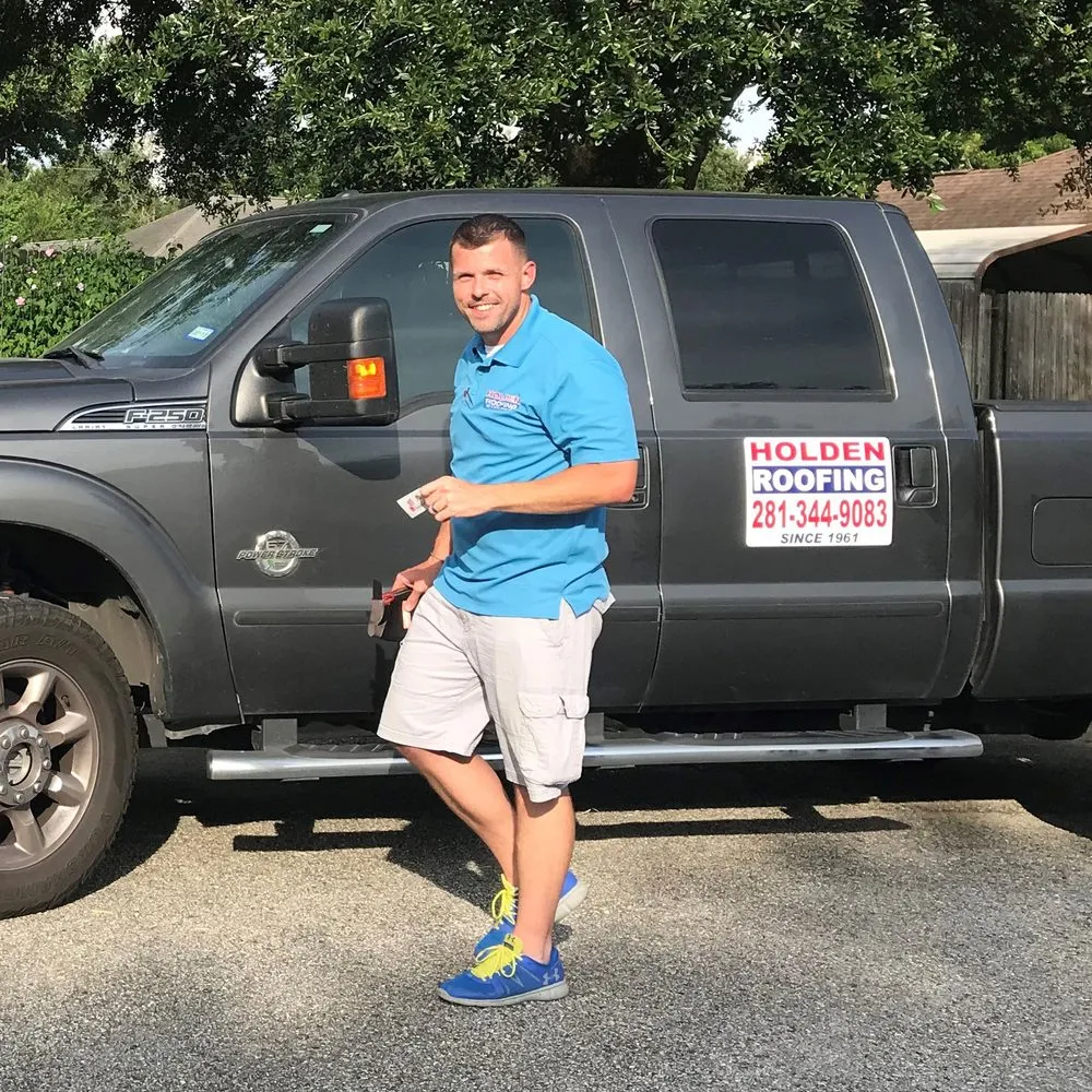 Slide of Holden Roofing