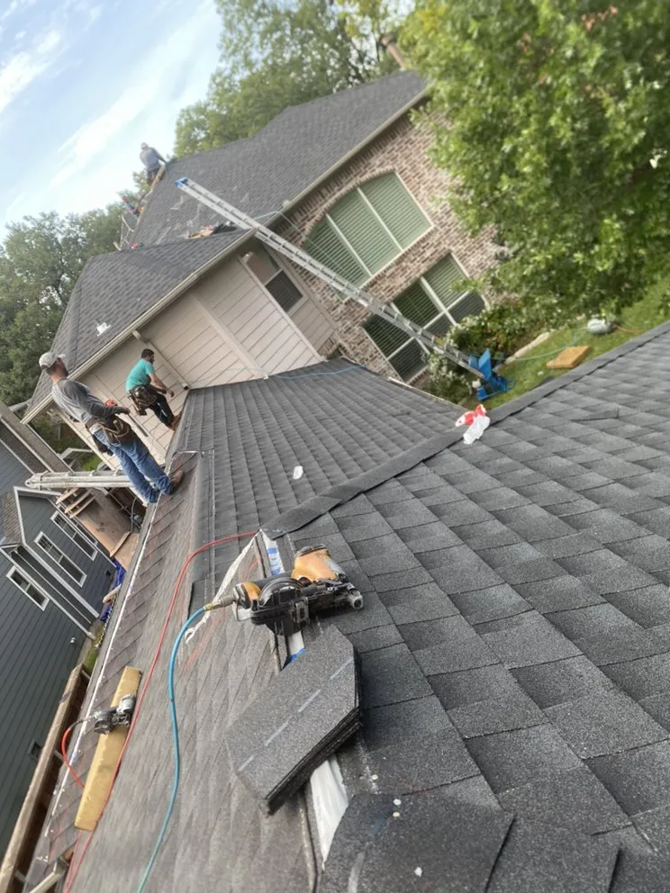 Slide of Holguin Roofing & Exteriors