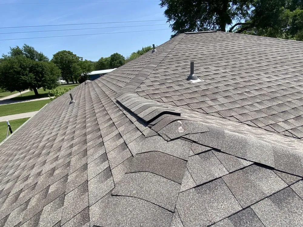 Slide of Holguin Roofing & Exteriors