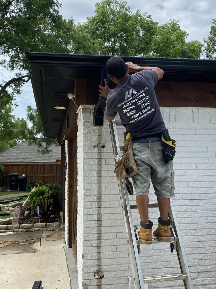 Slide of Holguin Roofing & Exteriors