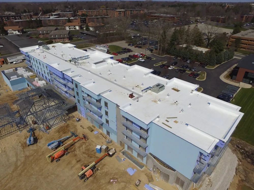 Slide of Holland Ready Roofing