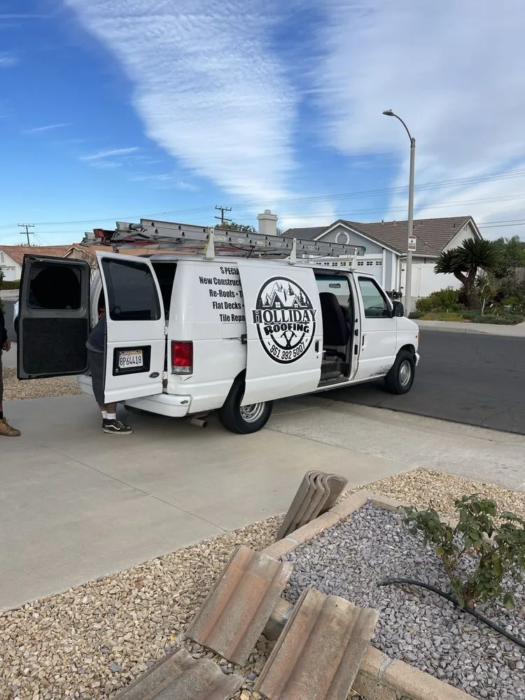 Slide of Holliday Roofing