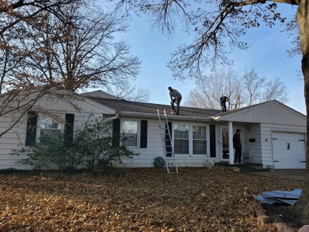 Slide of Holmes Roofing